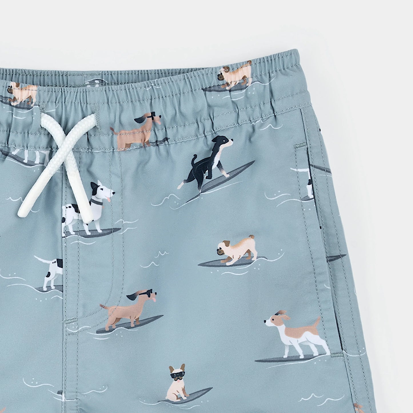 Surfing Pups Print On Blue Swim Trunks